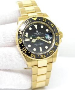 18K Yellow Gold with Black Dial